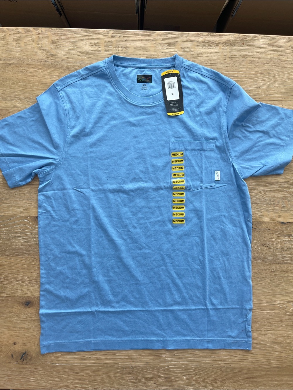 Greg Norman Collection Light Blue Short Sleeve Pocket Tee